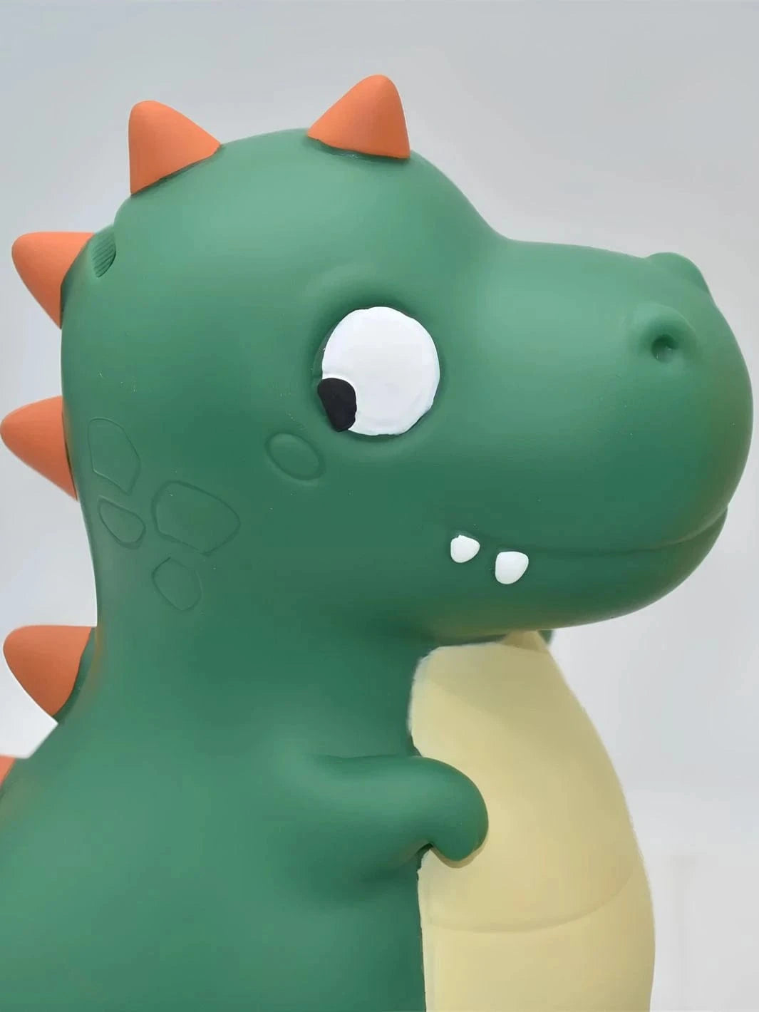 Tirelire en forme de dinosaure