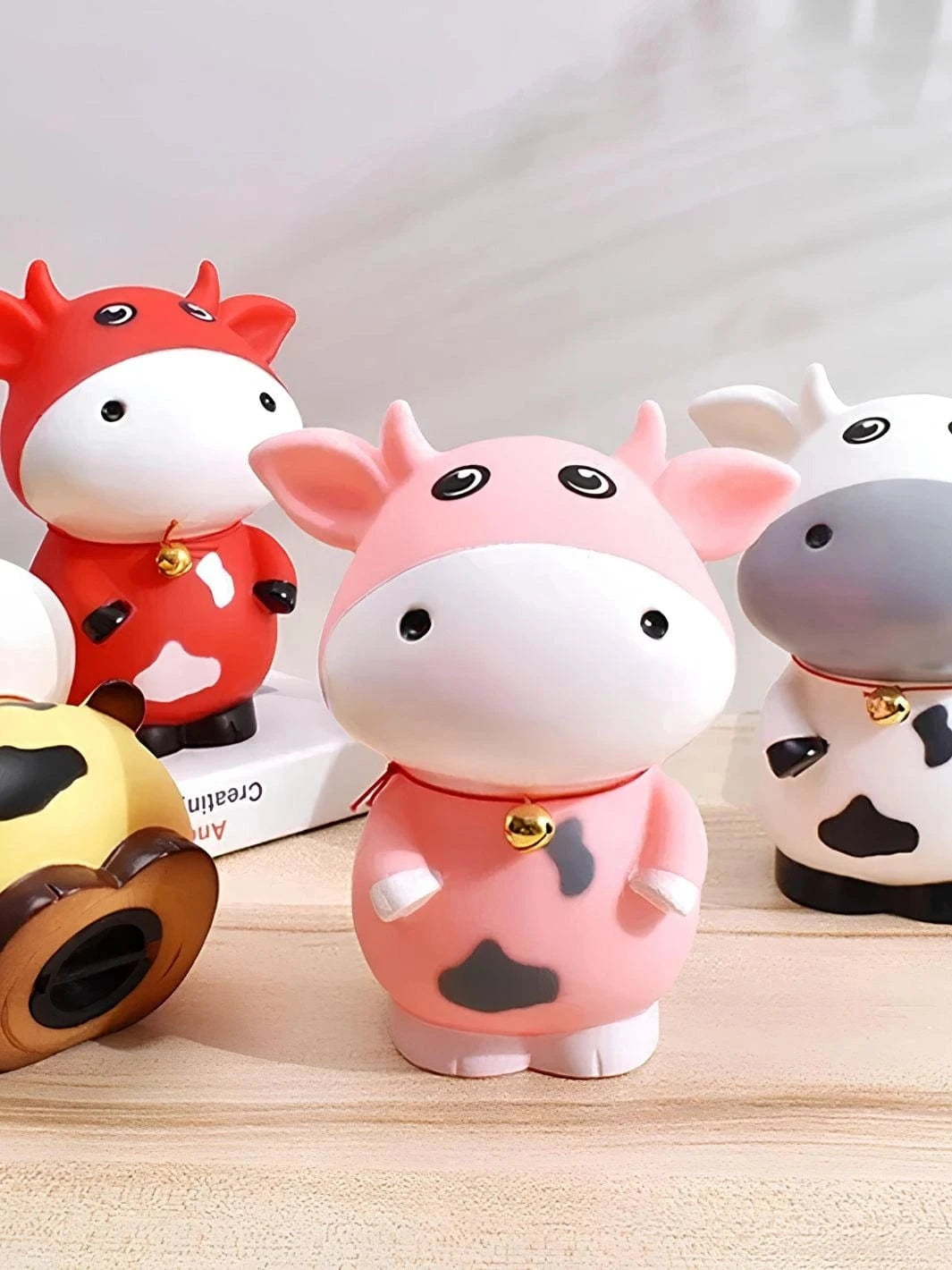 Tirelire vache multicolore