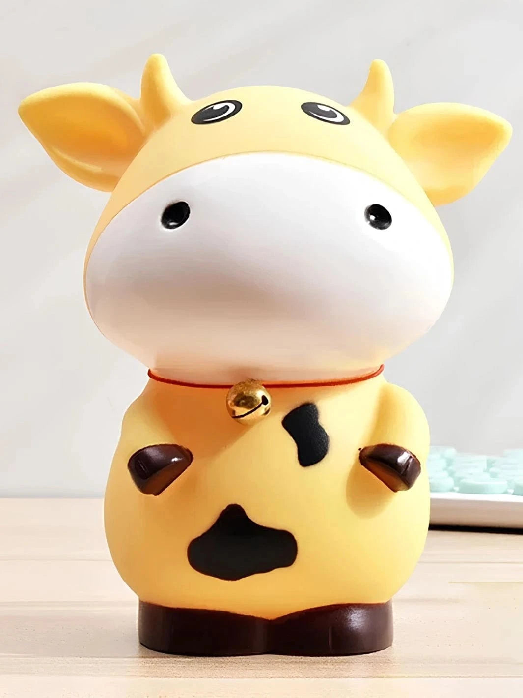 Tirelire vache multicolore